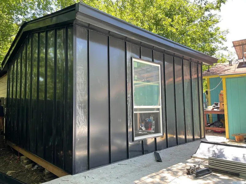 Black standing seam metal wall panels for Metal Roof Installation in Bloomington